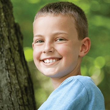 a boy smiling